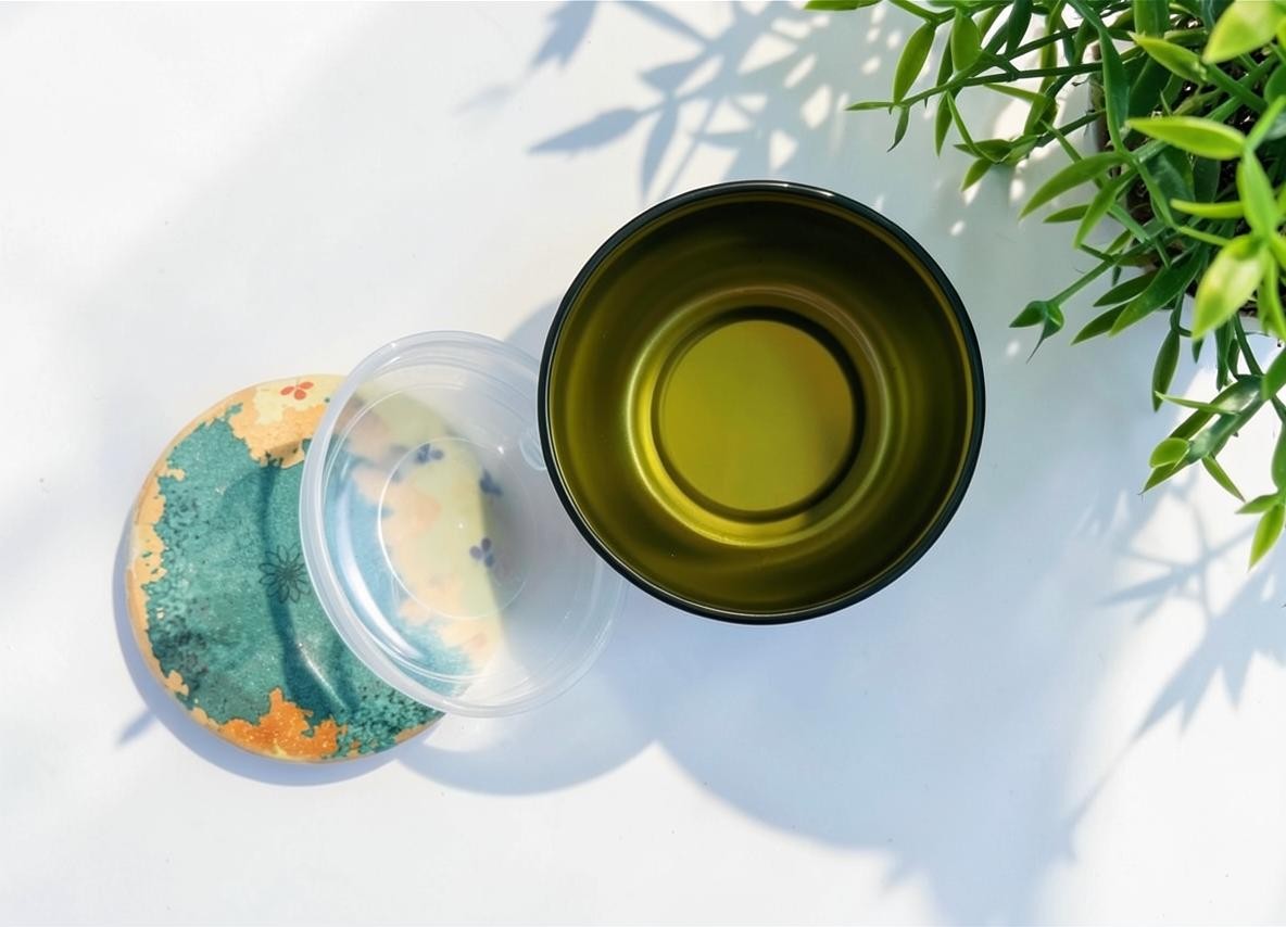 LISATA MATCHA daily ritual bundle featuring an open Japanese tea canister with a decorative lid and inner seal