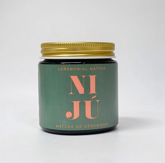 LISATA MATCHA Niju ceremonial grade matcha powder in a dark green jar with a gold lid on a white background