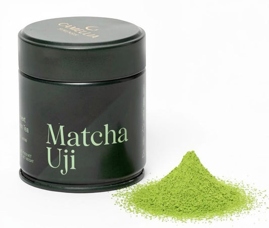 LISATA MATCHA Camellia Sinensis Matcha Uji 40g tin with a small pile of vibrant emerald green matcha powder.